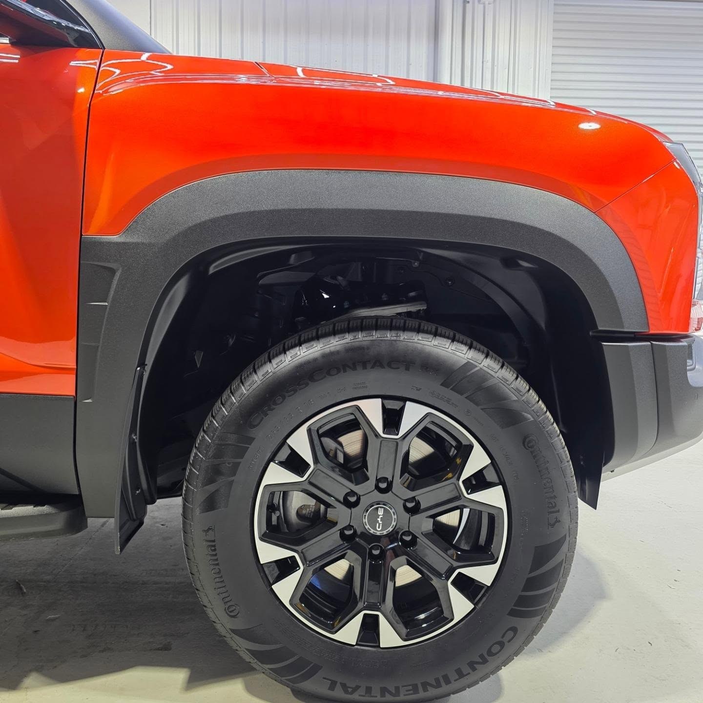 Ceramic coating Lithgow - close-up of coated paintwork and wheel arch